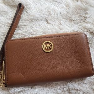 Michael Kors tan wristlet *never used*